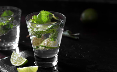 Wall Mural - Fresh mojito cocktail with lime and mint