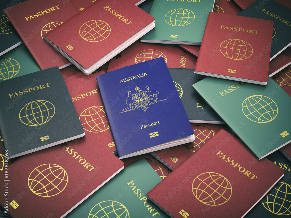 Passport of Australia on the pile of different passports. Immigration ...