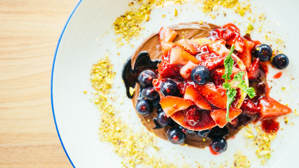 Sticker - Pancakes with mixed berry fruit in white plate