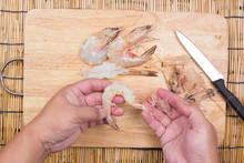 Chef Peeling Shell Of Shrimp