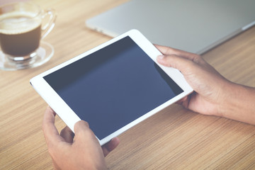 Aufkleber - selective focus hand hold digital tablet on work desk