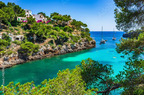 Picturesque seascape bay with boats, Spain Mediterranean Sea, Balearic Islands Tableau sur Toile