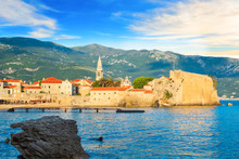 BUDVA, MONTENEGRO - JULY 10: Beautiful View Of The Old Town Of Budva And The Bell Tower Of The Church Of St. John On July 10, 2016 In Budva.