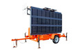 © Noel - Portable electronic highway information billboard mounted on orange trailer. Isolated.