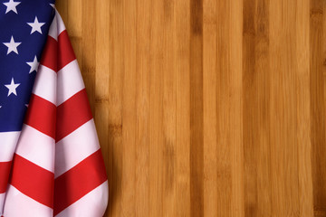 American flags on wood table.