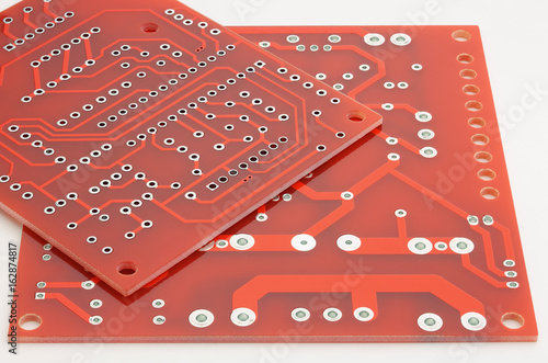 Fotografie, Obraz New printed circuit boards without electronic components on a white background
