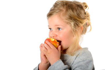 Wall Mural - sweet girl eating apple