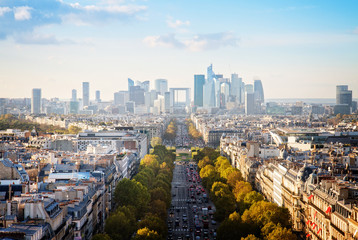 skyline of paris city towards la defense district, france, retro toned