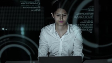 businesswoman looking at futuristic interface. IoT(Internet of Things). ICT(Information Communication Technology). GUI(Graphical User Interface). HUD(Heads up Display).