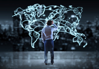 Wall Mural - Businessman watching drawing manuscript world map connection on a rooftop 3D rendering