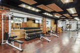 Fototapeta Zwierzęta - Interior view of a gym with equipment.