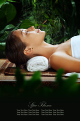 Wall Mural - portrait of young beautiful woman in spa environment. banner, space for text.