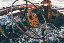 Burned Out Car, Inside View, Rusty Steering Wheel,