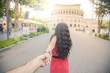© ARAMYAN - Couple holding hands in street