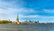 The Statue Of Liberty And Manhattan, New York City