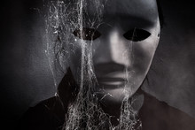 Mysterious Woman In Black Wearing White Mask Hidden Behind Spider Web,Scary Background For Book Cover