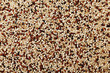 Mixed quinoa background top view.