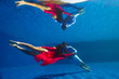 © Oleg - Couple swimming underwater