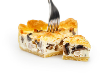 Wall Mural - Slice of chicken & mushroom pie on the fork isolated on white. Focus on little piece of pie 