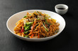 Udon noodles with fresh vegetables with soy sauce