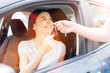 © zinkevych - Beautiful young woman accepting car keys