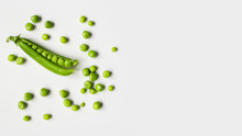 Green Peas On A White Background. 
