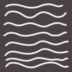 Wall Mural - Wavy shapes horizontal white ropes on black background.