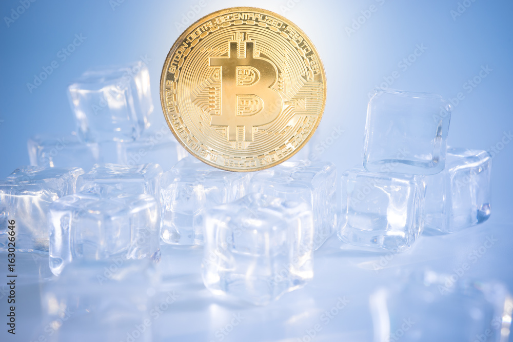 Gold Bitcoins in the ice cube