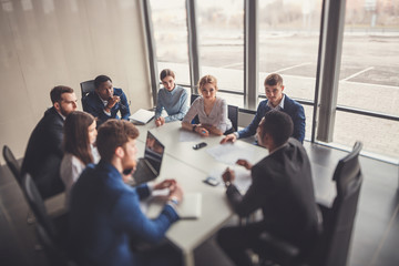 Wall Mural - Corporate business team and manager in a meeting