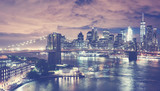 Fototapeta  - Vintage toned picture of New York City skyline at night, USA.