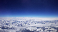 Flying Over The Clouds. Clouds And Skyline Horizon Panoramic View.