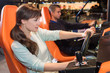 © auremar - woman play the video game at recreational salon