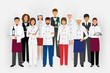 © generationclash - Hotel restaurant team concept in uniform. Group of catering characters standing together chef, cook, waiters and barman.