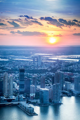 Fototapete - New Jersey skyline with sunset over Jersey City