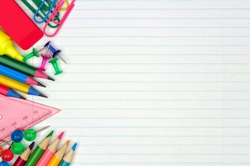 Wall Mural - Colorful school supplies side border over a lined paper background
