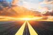 © ABCDstock - Asphalt road and sky cloud landscape at sunset
