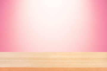 Wall Mural - Wood table top on gradient pink background