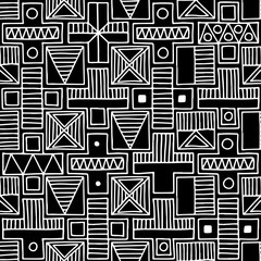Wall Mural - Seamless vector pattern. Black and white geometrical background with hand drawn decorative tribal elements. Print with ethnic, folk, traditional motifs. Graphic vector illustration.