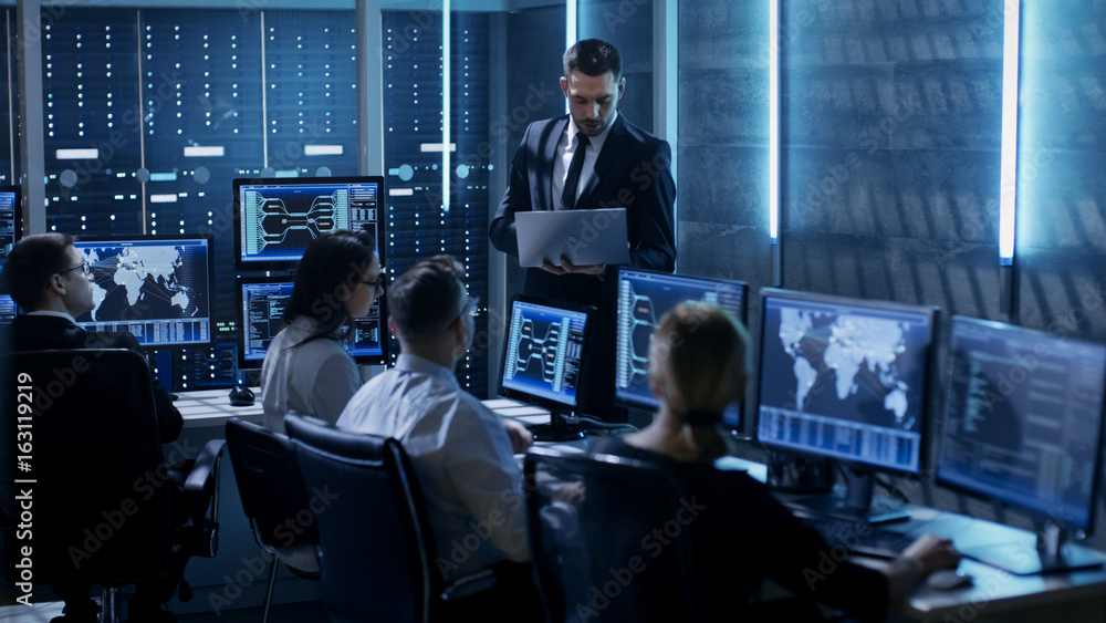 Professional IT Engineers Working in System Control Center Full of ...