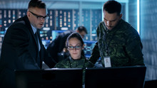 Government Surveillance Agency And Military Joint Operation. Male Agent, Female And Male Military Officers Working At System Control Center.
