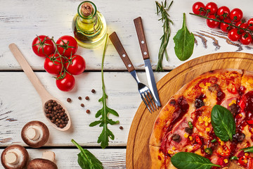 Wall Mural - Pizza with spices and ingredients.