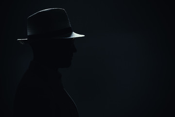 Silhouette of a Man With Hat