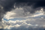 Fototapeta Niebo - a big and fluffy cumulonimbus cloud in the blue sky