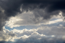 A Big And Fluffy Cumulonimbus Cloud In The Blue Sky