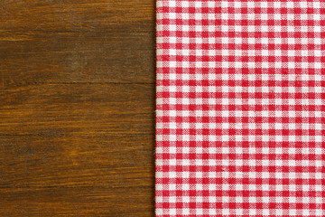 Wall Mural - Tablecloth on the wooden table./Tablecloth on the wooden table