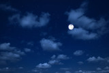 Fototapeta Niebo - night sky with clouds and stars.