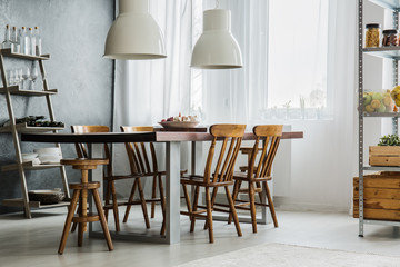 Wooden table with metallic legs