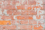Fototapeta  - Vintage damaged brick wall with cracks, background and texture, for natural design, patterns, extured background with space for copy text.