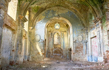 Inside View In Sun Light Of Abandoned Catholic Church XVIII Century In Mezhyriv Village In Ukraine