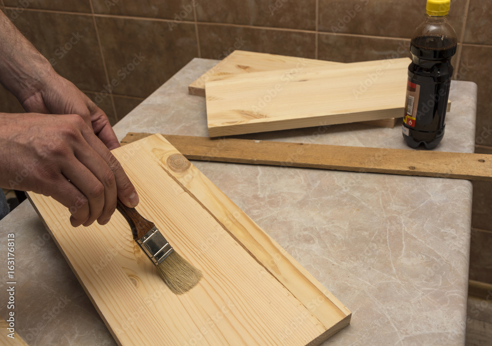 Tree Staining Preparation of the tree prior to treatment with dark stains Stock Photo ...